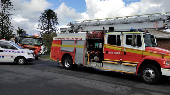 Firefighters at the scene of the fire in Parkwood this morning. Picture: Jerad Williams.