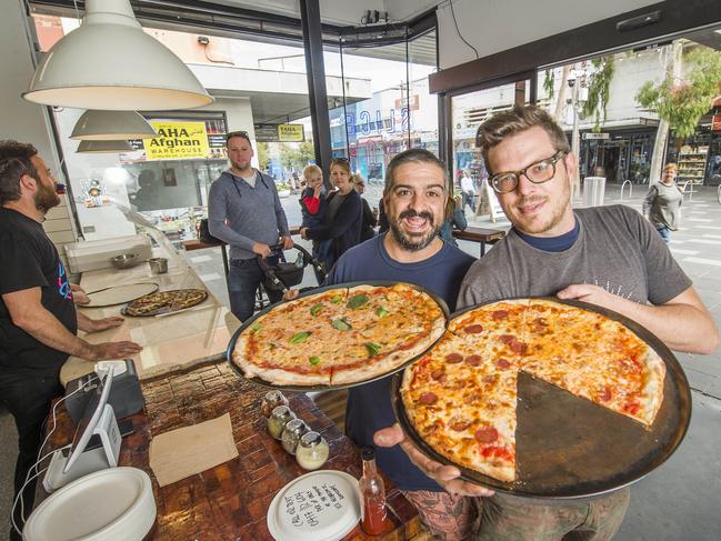 American Barbecue experts Steve Kimonides and Raphael Guthrie with their unique pizzas.