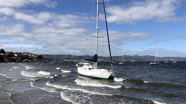 A strong seabreeze has caused a boat to lose its mooring at Short Beach, Sandy Bay. Photo: Richard Gerathy