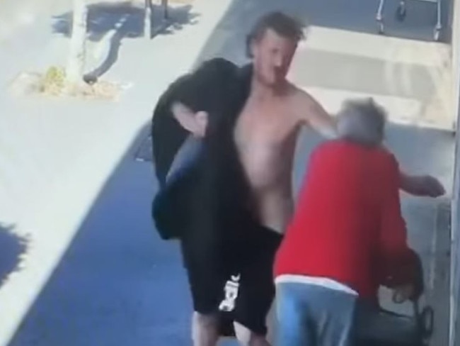 CCTV of a man who approached a 92-year-old in Douglas parade,  Williamstown hitting her and pushing her to the ground on Wednesday 30th of April. Source: Facebook , , Witnesses alleged the attack caused the woman to fall to the ground and lose consciousness.