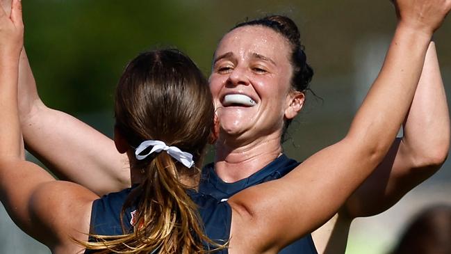 MACKAY, AUSTRALIA - SEPTEMBER 08: Lulu Beatty (left) and Harriet Cordner of the Blues celebrate during the 2024 AFLW Round 02 match between the Gold Coast SUNS and the Carlton Blues at Great Barrier Reef Arena on September 08, 2024 in Mackay, Australia. (Photo by Michael Willson/AFL Photos via Getty Images)