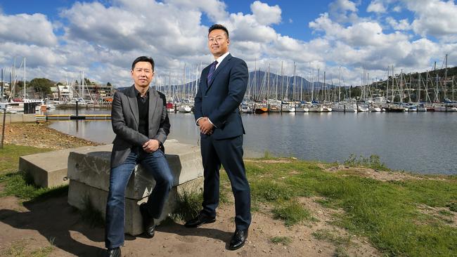 Hunter Developments architect Ganche Chua, left, and Chambroad Overseas Investment Australia deputy general manager Finely Zhang at the proposed site of the development at Kangaroo Bay on the Eastern Shore. Picture: RICHARD JUPE