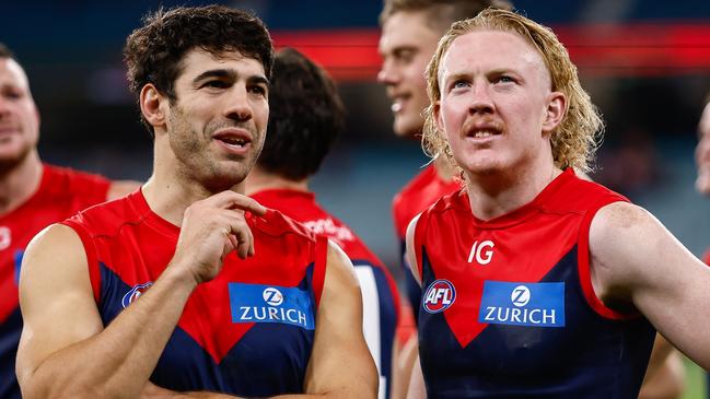 MELBOURNE, AUSTRALIA - APRIL 29: Clayton Oliver and Christian Petracca of the Demons are seen during the 2023 AFL Round 07 match between the Melbourne Demons and the North Melbourne Kangaroos at the Melbourne Cricket Ground on April 29, 2023 in Melbourne, Australia. (Photo by Dylan Burns/AFL Photos via Getty Images)