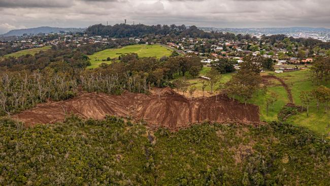 An aerial shot of the Toowoomba escarpment near Mount Lofty, which shows significant tree-clearing by land owner Defence Housing Australia.