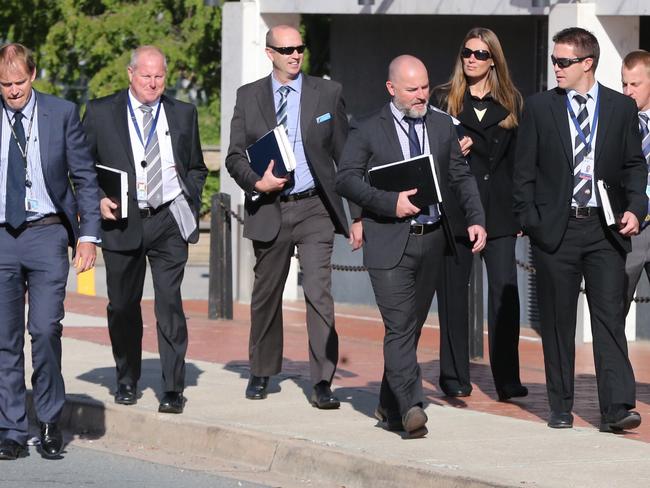 Detectives arrive at ACT Children's Court where a 16-year-old is extradited to NSW on murder charges. Picture: Ray Strange