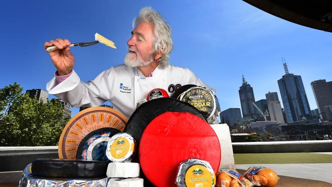 Chief judge Russell Smith with a mountain of cheese. Picture: Tony Gough