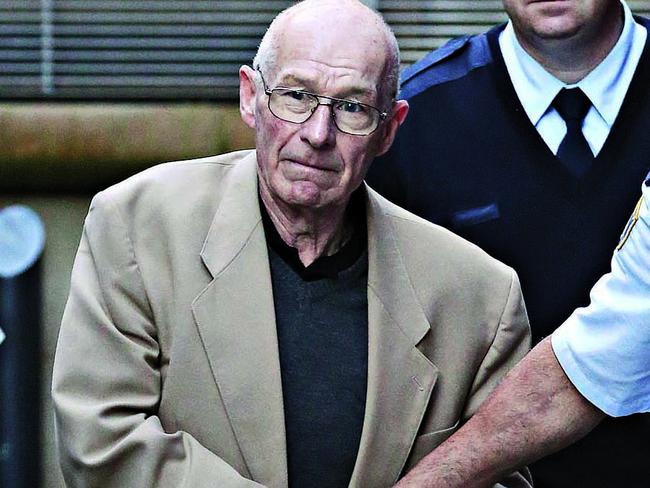 Rogerson is led away after being found guilty of Jamie Gao’s murder in 2016. Picture: Adam Yip 