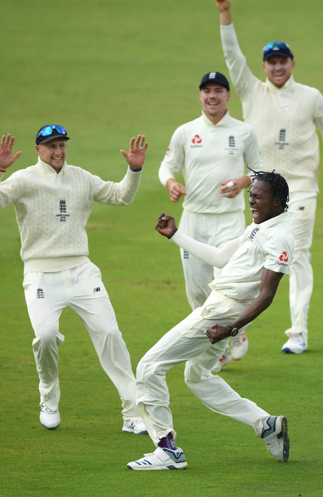 Day 5: Archer celebrates with teammates after bowling out Usman Khawaja. Picture: Getty