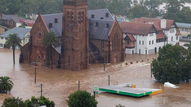 An aerial view of a flooded church and other buildings in the northern New South Wales city of Lismore from an Australian Army helicopter taking part in Operation Flood Assist 2022. Picture: AFP PHOTO / AUSTRALIAN DEFENCE FORCE