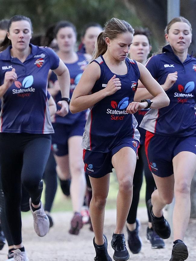 — Emma de Broughe leads the way as the Scorpions hit Uni Loop for pre-season training. Picture SARAH REED