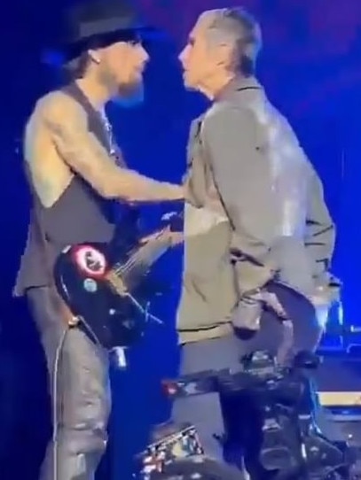 Perry was escorted off stage. Picture: YouTube