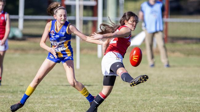 Action from a Everton Wolves and Victoria Point Sharks junior girls’ game. (AAP Image/Richard Walker)