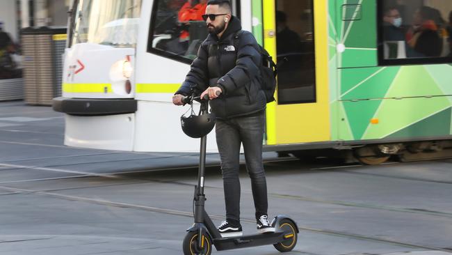 Police say it’s common to see e-scooter riders not wearing helmets. Picture: NCA NewsWire