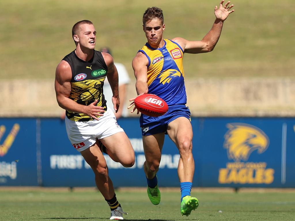 Elijah Hewett burns off Sam Lalor to kick a running goal. Picture: Janelle St Pierre/Getty Images