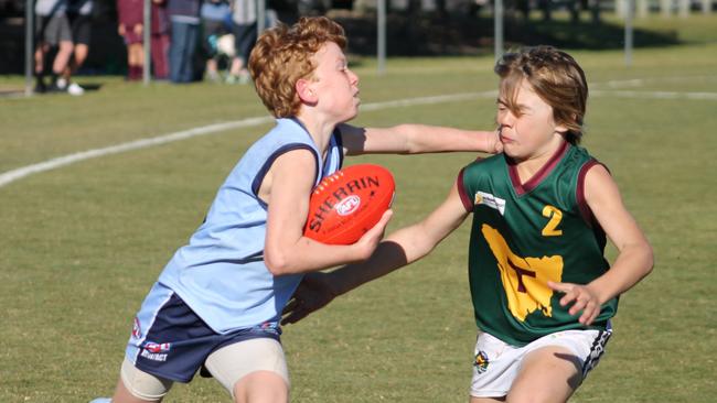 Ethan Smith (left) playing AFL with the Maroubra Saints. Picture: Supplied