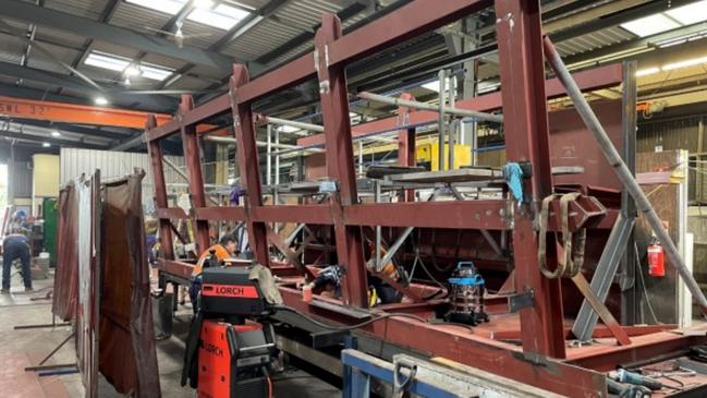 Work crews have been busy welding together huge steel pipes to form the artificial island’s floating frame. Picture: Supplied