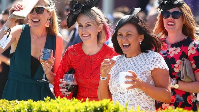 MELBOURNE, AUSTRALIA - OCTOBER 14:  Racegoers cheer during a race during Melbourne Racing on Caulfield Guineas Day at Caulfield Racecourse on October 14, 2017 in Melbourne, Australia.  (Photo by Scott Barbour/Getty Images)