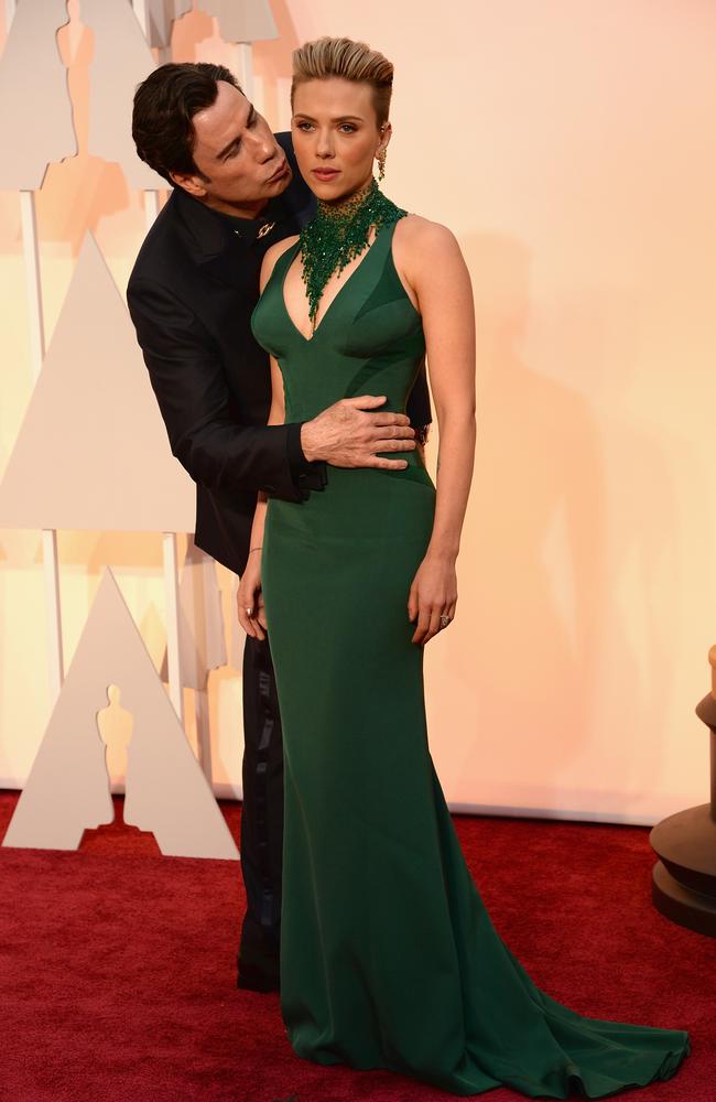The Oscars’ gift to us all this year ... Travolta’s totally not awkward embrace on the red carpet.