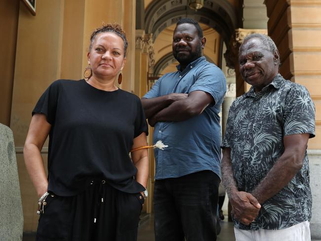 15/12/23: Tiwi islander elders, Antonia Burke, Simon Munkara and Pirrawayingi Puruntatameri protesting the NAB AGM over the bank's funding of Santos' gas projects in the NT. John Feder/The Australian.