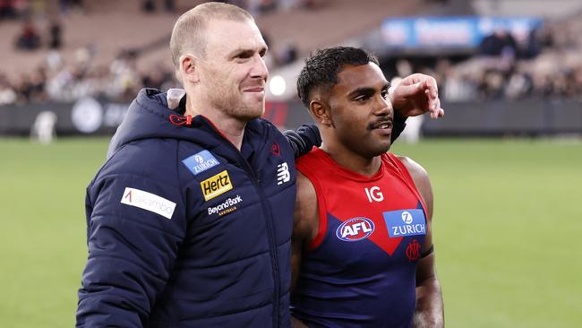 MELBOURNE, AUSTRALIA - AUGUST 23: Simon Goodwin, Senior Coach of the Demons embraces Kysaiah Pickett of the Demons after  the round 24 AFL match between Melbourne Demons and Collingwood Magpies at Melbourne Cricket Ground, on August 23, 2024, in Melbourne, Australia. (Photo by Darrian Traynor/Getty Images)