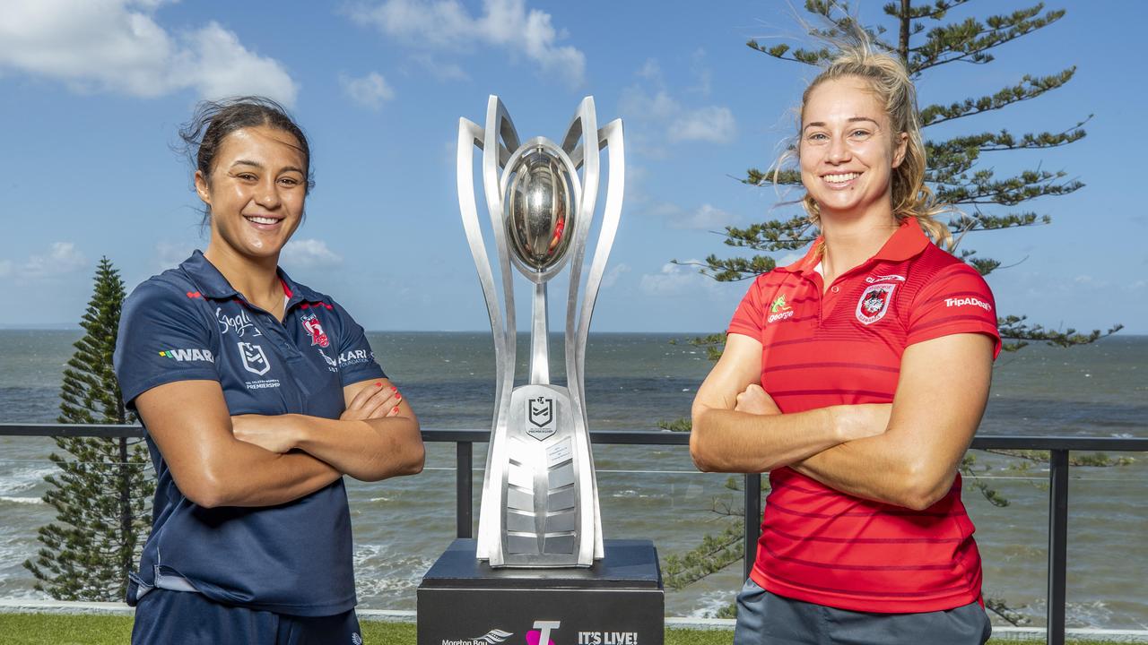 Roosters Corban Baxter and Dragons Kezie Apps with trophy at NRLW Grand Final trophy.