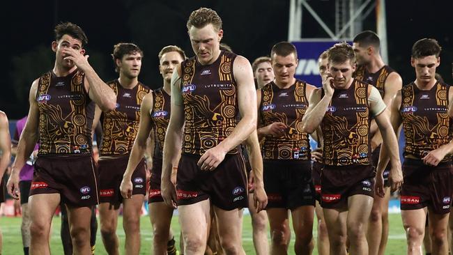 DARWIN, AUSTRALIA - MAY 15: Hawthorn walk off after the game during the 2025 AFL Round 10 match between the Gold Coast Suns and the Hawthorn Hawks at TIO Stadium on May 15, 2025 in Darwin, Australia. (Photo by James Wiltshire/AFL Photos via Getty Images)