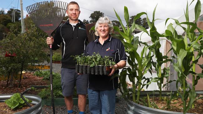 Luke Horne garden manager and Kaye Bradley, volunteer at the garden. West Moonah Community Garden that is run with West Moonah Neighbourhood House. Picture: Nikki Davis-Jones