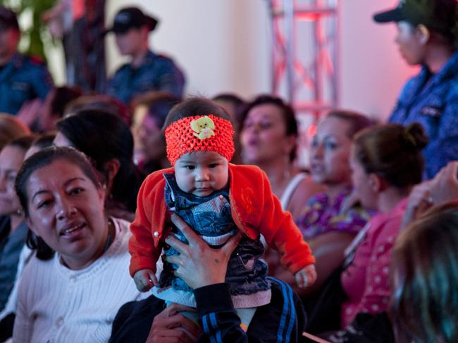 Prisoners, including several mothers with young children, attend a TEDx motivational talk on June 23, 2015 in Bogota, Colombia. Picture: Supplied