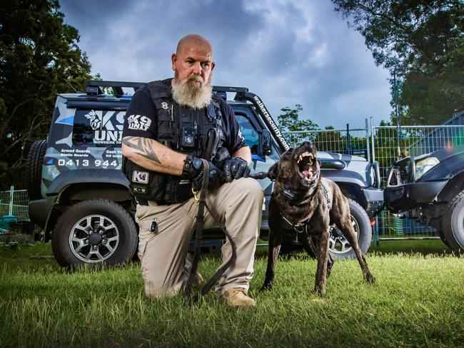 Dan Walker with his Dutch Shepherd Xee who is a security guard for Chelmer, Sherwood and Graceville.Picture: Nigel Hallett