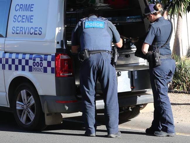 .Police investigators arrive at a crime scene in Taylors Hill. Four African teens are wanted after two men were bashed over the head with baseball bats and crowbars in Taylors Hill. Monday, February 26. 2018. Picture: David Crosling