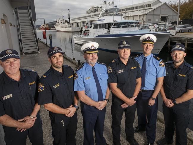 Police Vessel Van Diemen has been sold and is departing Tasmania after nearly 30years of service, Senior Constable Danny Korn, Senior Constable Matt Smith, Inspector Stephen Watson, Senior Constable Darren Leary, Assistant Commissioner Robert Blackwood and Constable Justin Wolfe. Picture: Chris Kidd