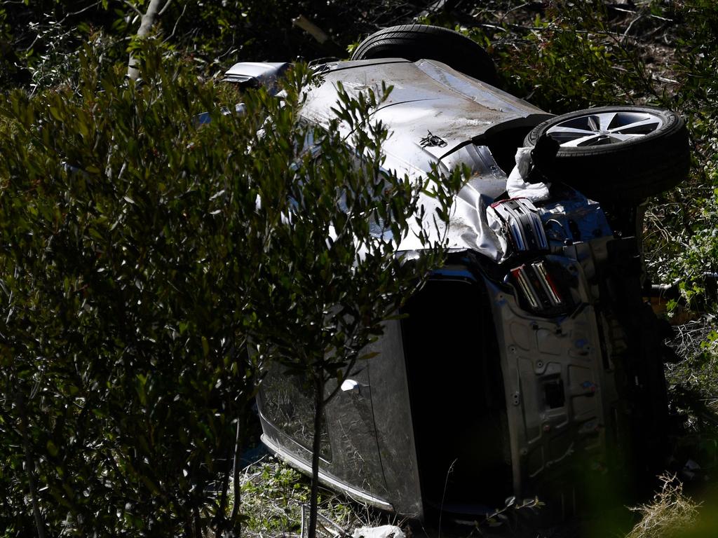 The SUV ended on its side after rolling multiple times.