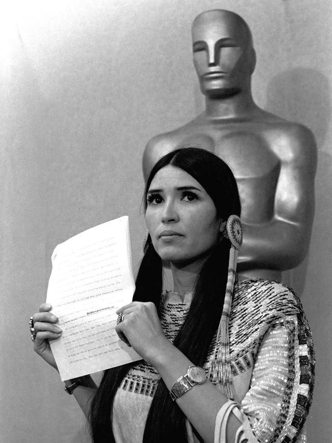 Sacheen Littlefeather holds up a statement that she read in 1973 at the Academy Awards in Los Angeles. Picture: AP