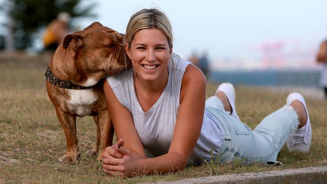 Sandra Abade (nee Maric) with her Australian Bulldog Carlos in 2019. Picture: Toby Zerna