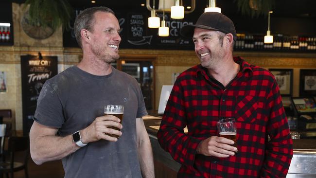 Aaron, left, said he drinks mid-strength beer so he can socialise longer. Picture: Justin Lloyd