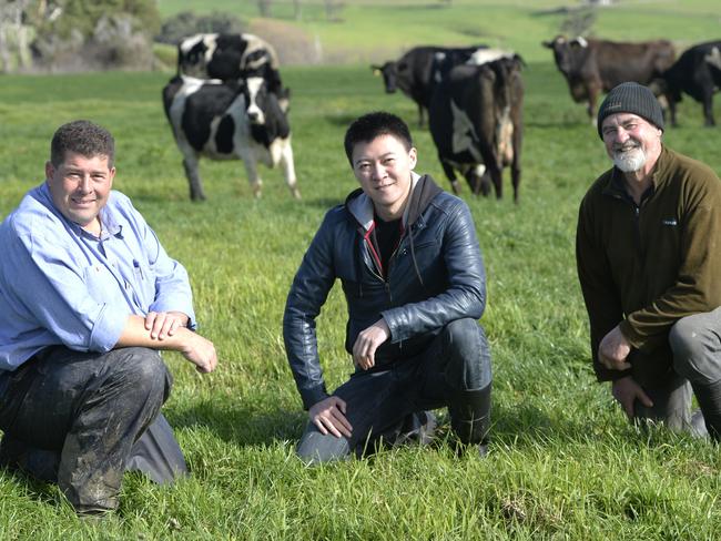 Chinese listed company DFP Australia has bought two farms, one at Poowong and one at Athlone. General manager Roy Wang at the Poowong Farm. along with Matt Hall farm consultant and Phil Good, Farm Business Manager.