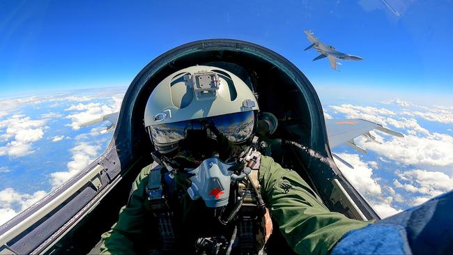 A fighter pilot with China’s People's Liberation Army Airforce during recent combat readiness exercises around the Taiwan. Picture: Getty Images