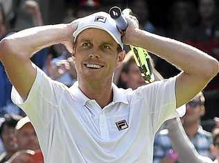 Sam Querrey of the US celebrates his win over Novak Djokovic. Picture: FACUNDO ARRIZABALAGA