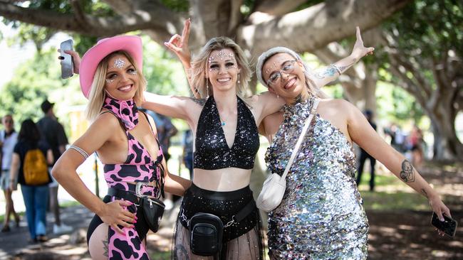 (L-R) Reanna Ede (26) Catherine Marsden (24) Lauren Burton (26) arrive at the Domain for Field Day. Picture: Julian Andrews