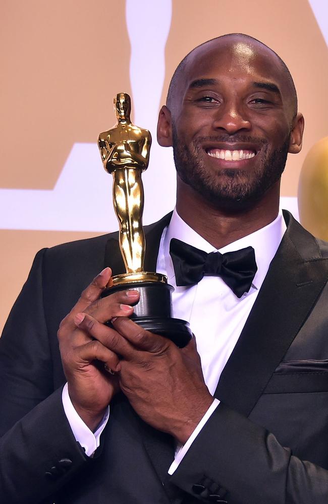 Kobe Bryant with his Oscar. Picture: AFP