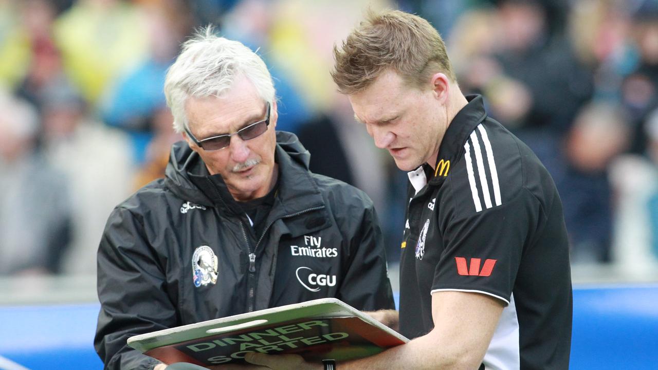 Mick Malthouse and Nathan Buckley in the 2011 Grand Final.