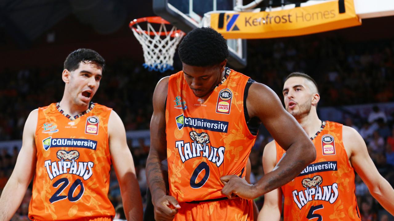 Cairns Taipans players Fabian Krslovic, Cameron Oliver and Mirko Djeric look dejected after losing National Basketball League (NBL) match at the Cairns Convention Centre. PICTURE: BRENDAN RADKE