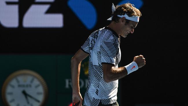 Roger Federer was down a break against Noah Rubin in the third set but his experience saw him home. Picture: AFP