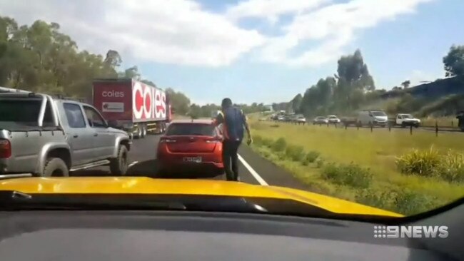 Dashcam footage captured the moments after the stabbing and showed Salami driving off in a red Toyota Corolla. Picture: Nine News