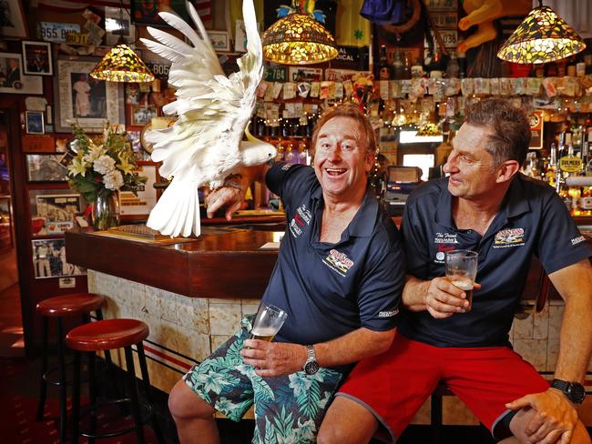 SUNDAY TELEGRAPH - 6/7/19Publican brothers Michael and Peter Byrnes (right) al;ong woth 7yr old cockatoo "George" at their pub "The Friend In Hand" in Glebe. They have just sold the pub and the cockatoo is being sold with it. Picture: Sam Ruttyn