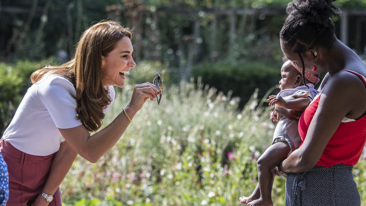 Kate was beaming as she entertained some of the children. Picture: Jack Hill/WPA Pool/Getty Images