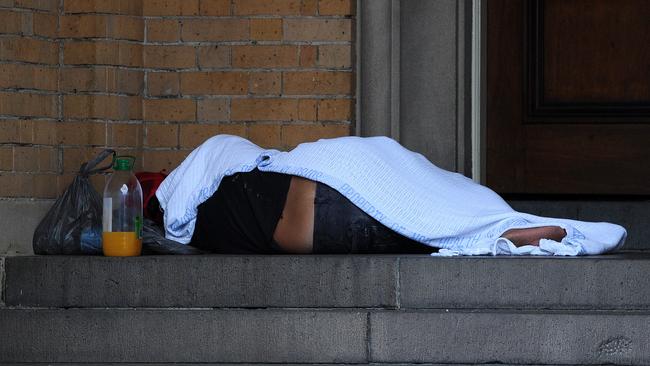 Homeless people in Newcastle CBD. Picture: Peter Lorimer