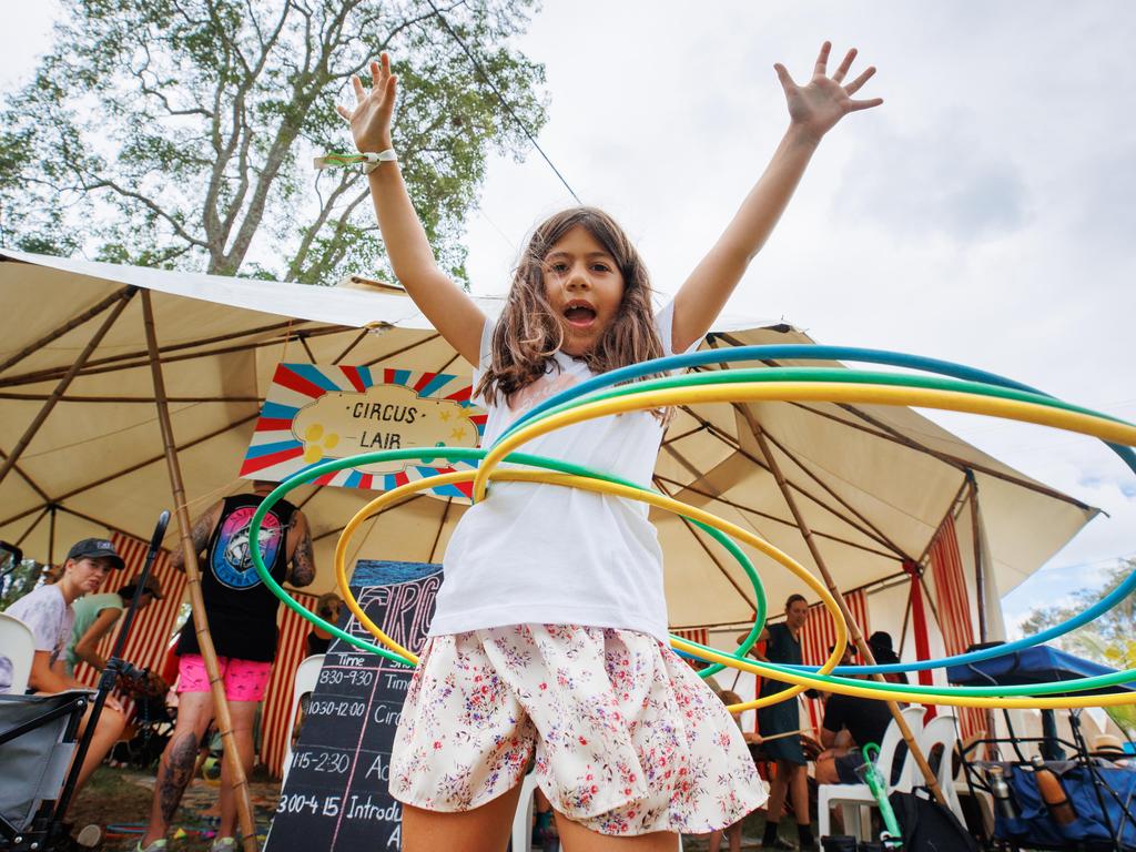 Tali Hamama, 7, from Mullumbimby, hula hooping on day one of the Woodford Folk Festival. Picture: Lachie Millard