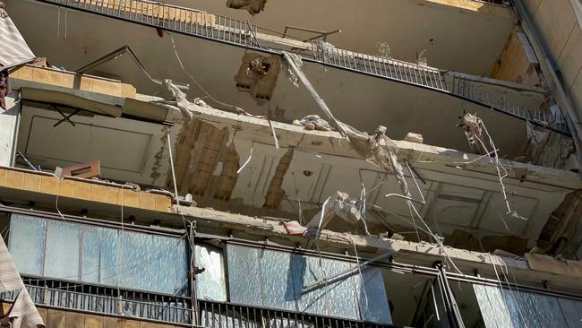 A picture shows a view of the destruction at an apartment building hit by an Israeli air strike in the Mouawwad neighbourhood of Beirut’s southern suburbs on October 3, 2024. (Photo by Hassan FNEICH / AFP)