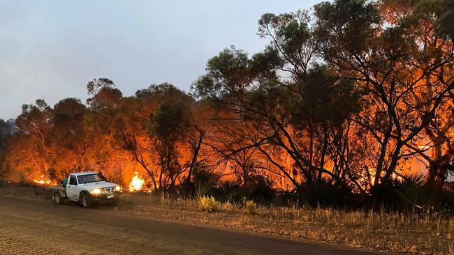 A Redlands charity cruise will raise money for those affected by Kangaroo Island’s devestating bushfires like this one burning near the Birchmore Lagoon, between Macgillivary and Birchmore on the Island. PICTURE: Gabriel Polychronis